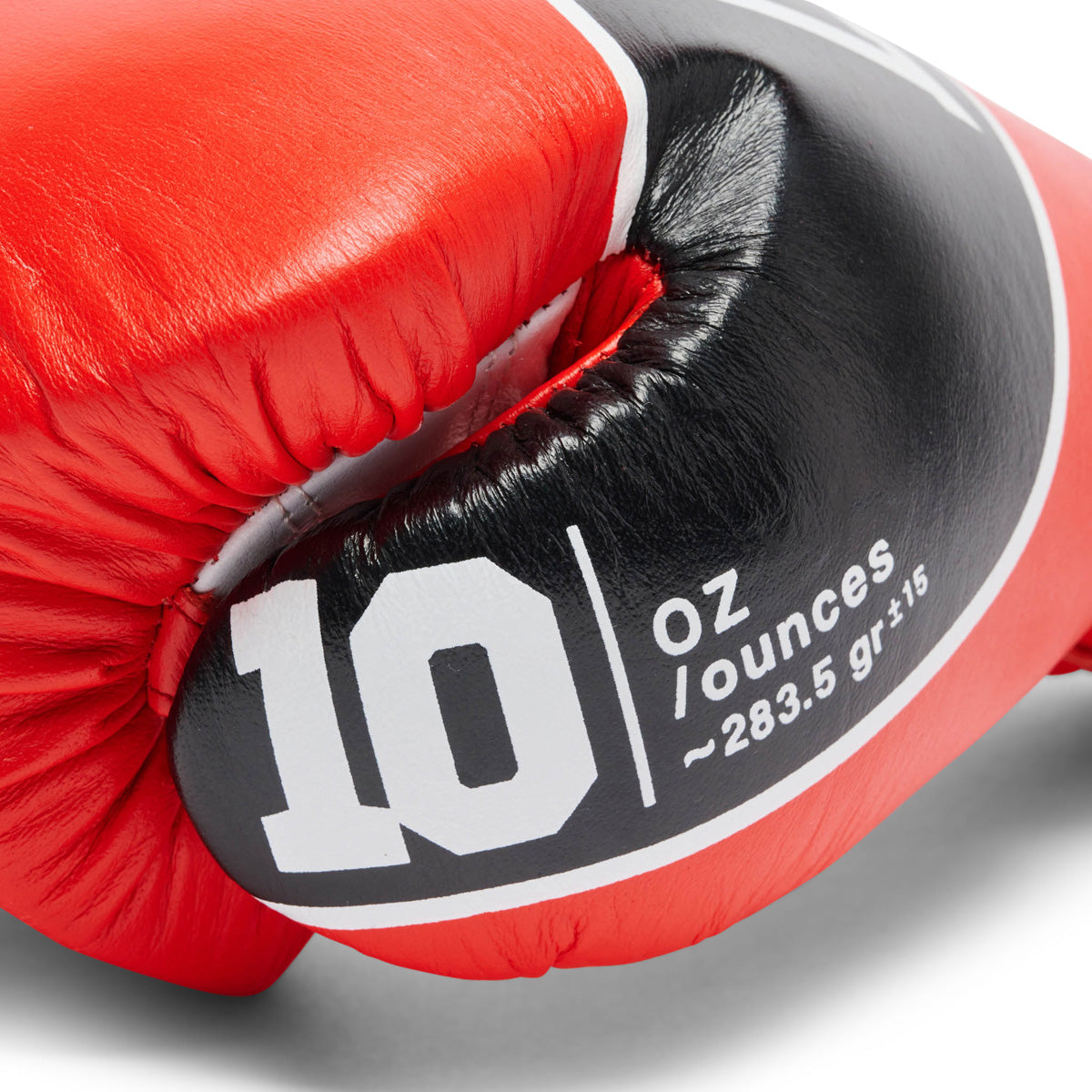 Boxing gloves Leone Shock Pro with laces GN057L Red - Combat Arena