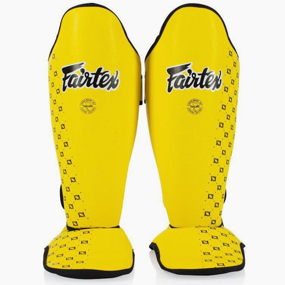 Shinguards Fairtex Competition SP5 with yellow footrests – Combat